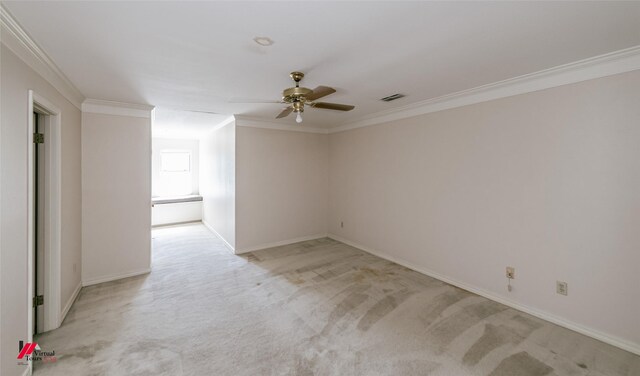 9855 Holamy Ln, Shreveport, LA 71106 - empty room featuring a ceiling fan, crown molding, light carpet, and baseboards