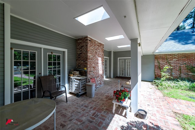 9855 Holamy Ln, Shreveport, LA 71106 - view of patio / terrace with french doors
