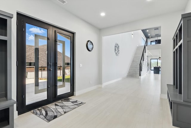 4971 Hawk Rd, Possum Kingdom Lake, TX 76450 - entryway featuring french doors, recessed lighting, stairs, baseboards, and light wood-type flooring