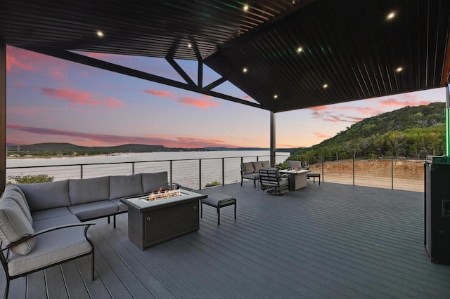 4971 Hawk Rd, Possum Kingdom Lake, TX 76450 - wooden deck with an outdoor living space with a fire pit and a water view