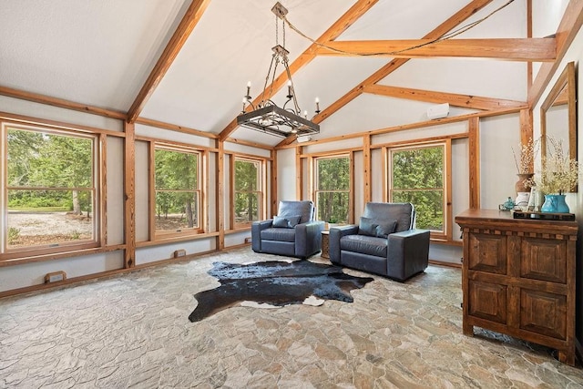 831 Old Justin Rd, Argyle, TX 76226 - sunroom / solarium featuring lofted ceiling and a chandelier