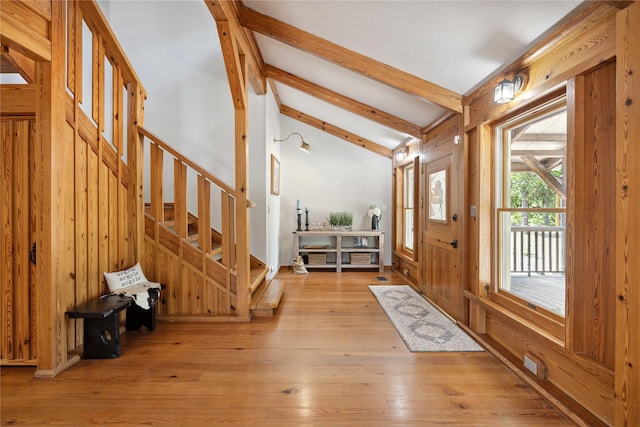 831 Old Justin Rd, Argyle, TX 76226 - entrance foyer with stairs, wood-type flooring, and wood walls