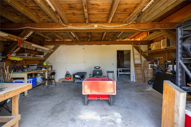 831 Old Justin Rd, Argyle, TX 76226 - below grade area featuring a workshop area and a garage