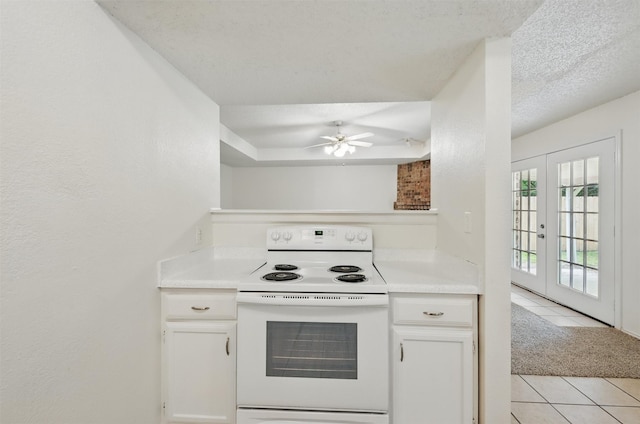 4111 Cypress Springs Dr, Arlington, TX 76001 - kitchen featuring electric range, light tile patterned floors, ceiling fan, french doors, and light countertops
