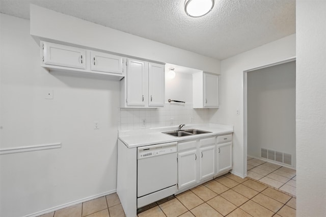 4111 Cypress Springs Dr, Arlington, TX 76001 - kitchen with dishwasher, a sink, white cabinets, and a textured ceiling