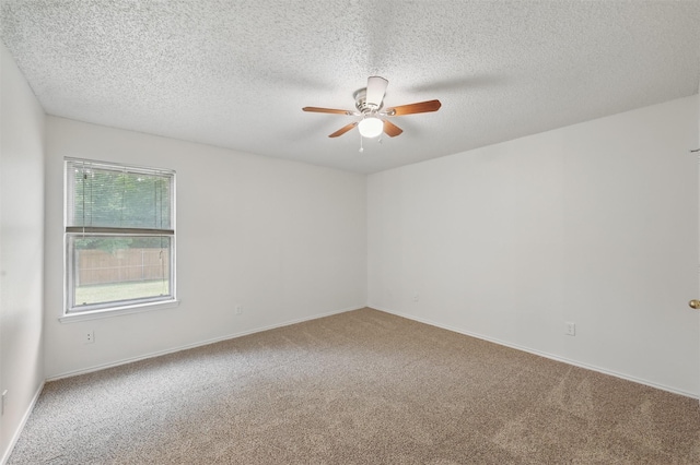 4111 Cypress Springs Dr, Arlington, TX 76001 - carpeted spare room with a ceiling fan, a textured ceiling, and baseboards