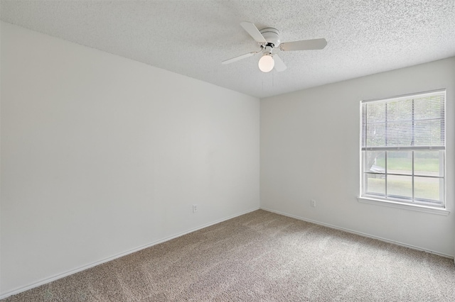 4111 Cypress Springs Dr, Arlington, TX 76001 - carpeted empty room featuring a ceiling fan, a textured ceiling, and baseboards
