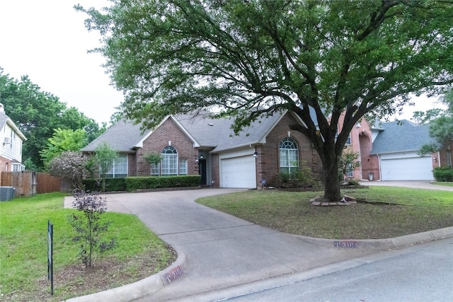 2104 Hunter Place Ln, Arlington, TX 76006 - view of front of home featuring brick siding, driveway, roof with shingles, and central AC
