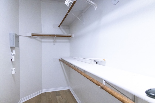 2104 Hunter Place Ln, Arlington, TX 76006 - walk in closet featuring wood finished floors
