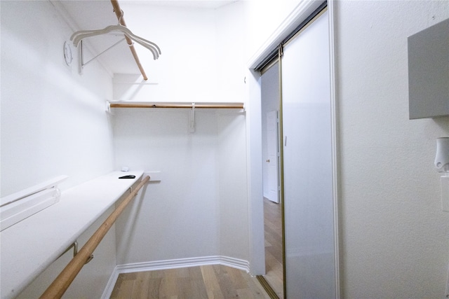 2104 Hunter Place Ln, Arlington, TX 76006 - spacious closet with wood finished floors