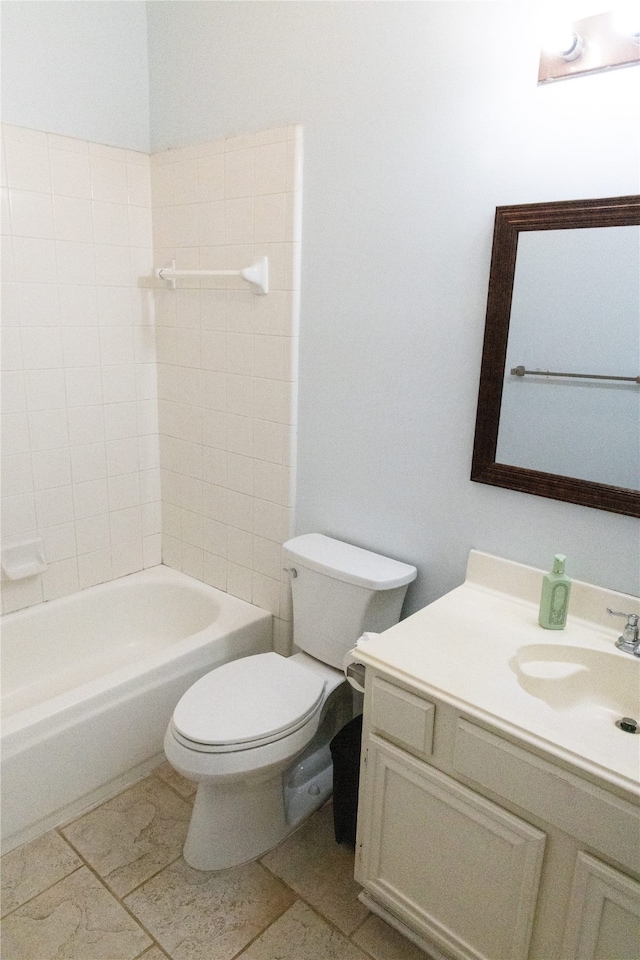 2104 Hunter Place Ln, Arlington, TX 76006 - bathroom with toilet, vanity, tile patterned floors, and shower / bath combination