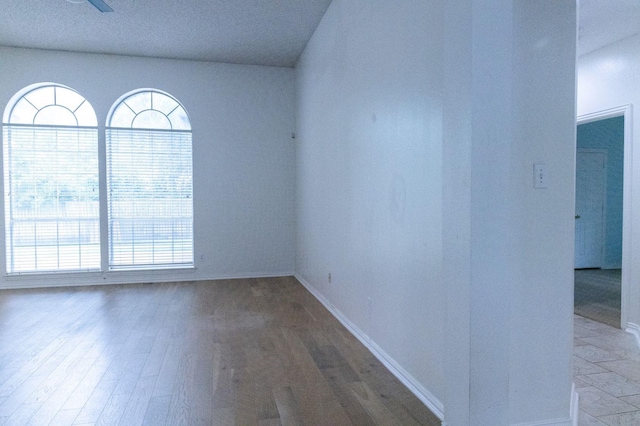 2104 Hunter Place Ln, Arlington, TX 76006 - unfurnished room with wood finished floors and baseboards