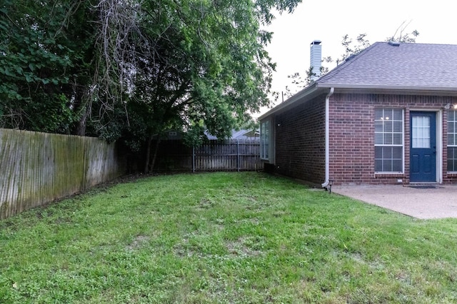 2104 Hunter Place Ln, Arlington, TX 76006 - view of yard with a patio
