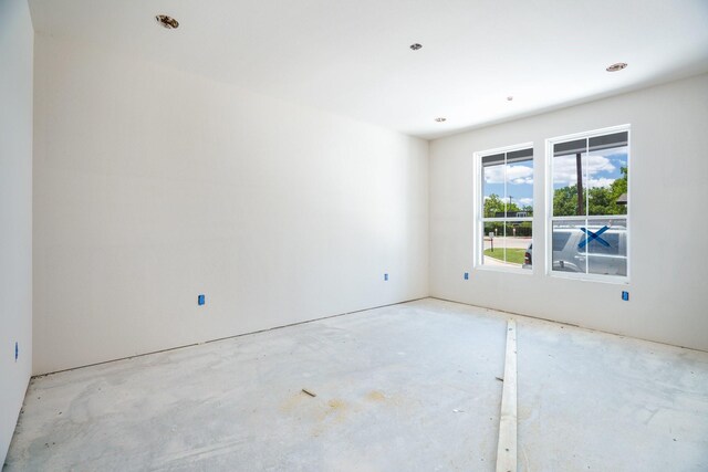 250 Harris St, Lewisville, TX 75057 - unfurnished room featuring unfinished concrete floors