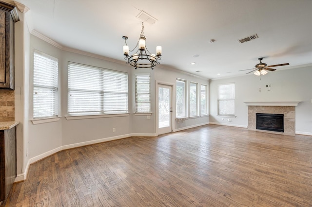 320 Collins St, Argyle, TX 76226 - unfurnished living room featuring a chandelier, wood finished floors, a tile fireplace, ornamental molding, and baseboards
