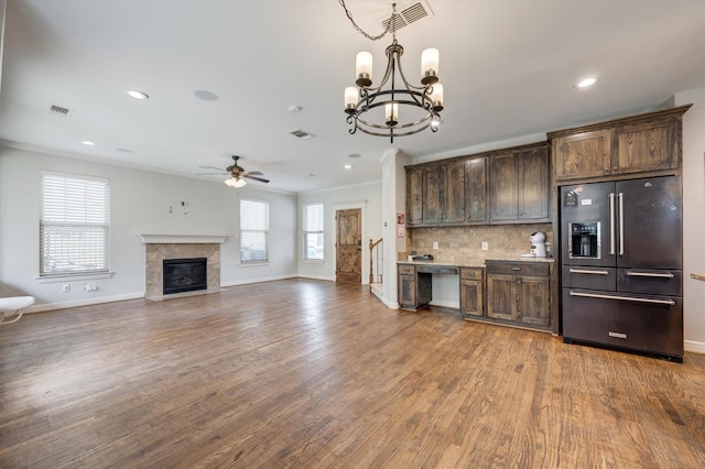 320 Collins St, Argyle, TX 76226 - kitchen featuring high quality fridge, dark brown cabinets, a ceiling fan, ornamental molding, and baseboards
