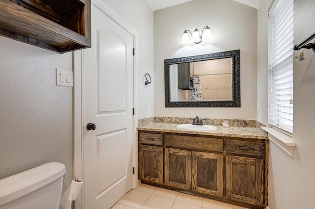 320 Collins St, Argyle, TX 76226 - full bath featuring toilet, healthy amount of natural light, vanity, and tile patterned floors