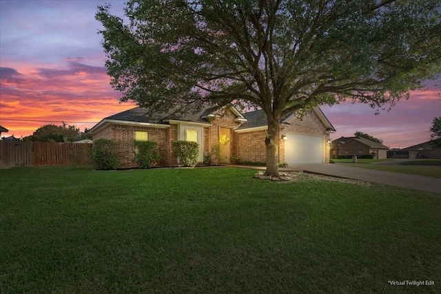 10285 Peony Ln, Waco, TX 76708 - view of front of home featuring concrete driveway, brick siding, and a garage