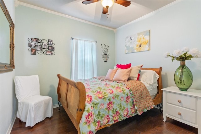 10285 Peony Ln, Waco, TX 76708 - bedroom with crown molding, dark wood-type flooring, a ceiling fan, and baseboards