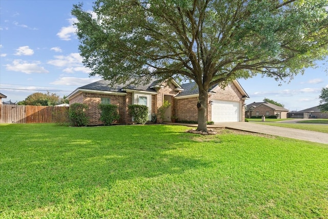 10285 Peony Ln, Waco, TX 76708 - view of front of home with driveway, brick siding, and an attached garage