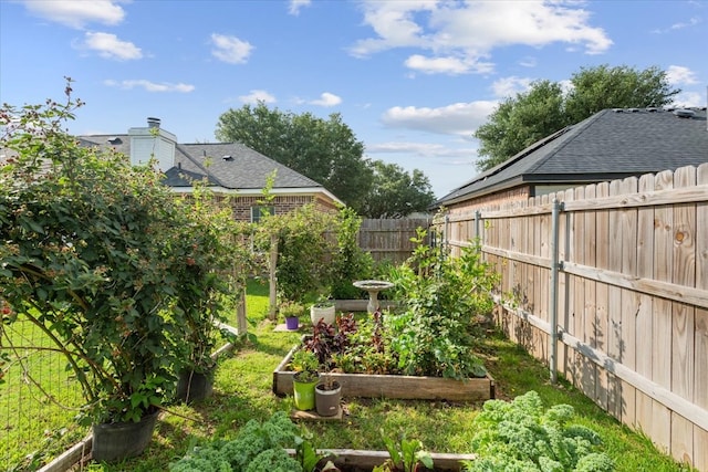 10285 Peony Ln, Waco, TX 76708 - fenced backyard with a garden