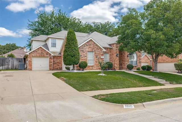 1109 Huntington Trl, Mansfield, TX 76063 - traditional home featuring central AC unit, brick siding, concrete driveway, a garage, and a shingled roof