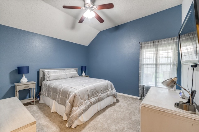 1109 Huntington Trl, Mansfield, TX 76063 - bedroom with a textured wall, light carpet, lofted ceiling, baseboards, and a ceiling fan