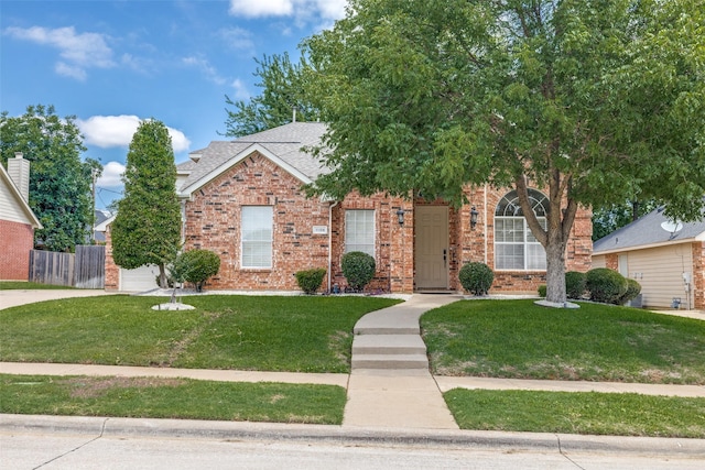 1109 Huntington Trl, Mansfield, TX 76063 - view of front of property featuring brick siding, roof with shingles, concrete driveway, and a garage
