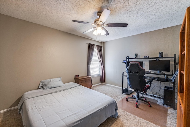 1109 Huntington Trl, Mansfield, TX 76063 - carpeted bedroom featuring a textured ceiling, baseboards, a desk, ceiling fan, and a textured wall