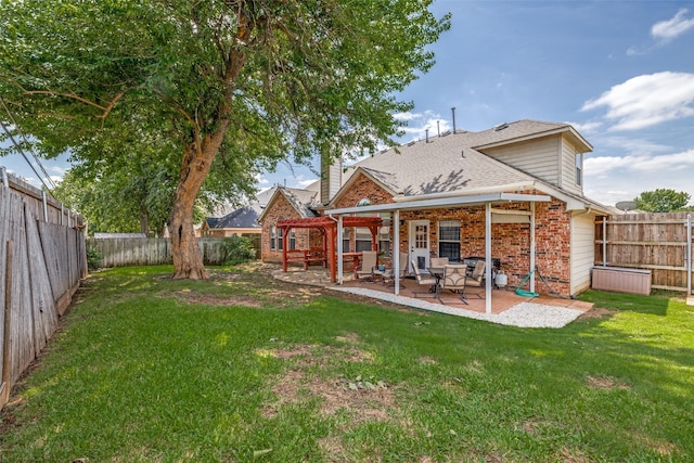 1109 Huntington Trl, Mansfield, TX 76063 - rear view of house with brick siding, a patio area, and roof with shingles
