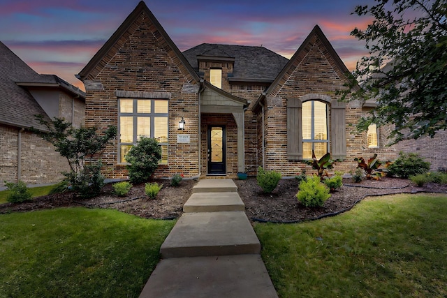 12164 Curry Creek Dr, Frisco, TX 75035 - view of front of house featuring a front yard and brick siding
