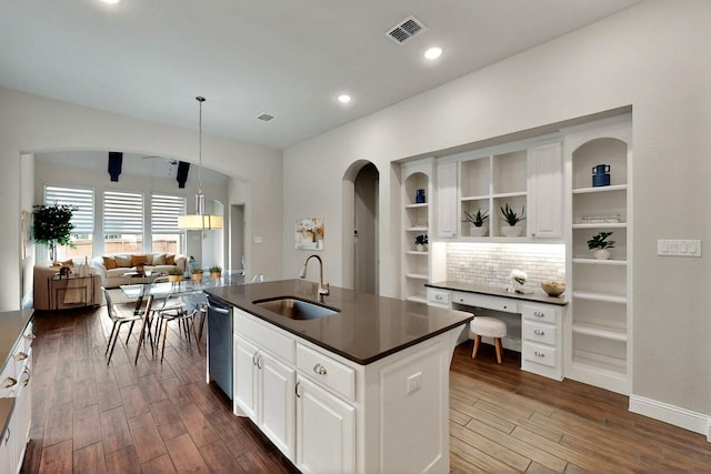 12164 Curry Creek Dr, Frisco, TX 75035 - kitchen featuring a sink, dark countertops, open shelves, dark wood finished floors, and recessed lighting