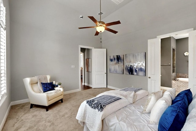 12164 Curry Creek Dr, Frisco, TX 75035 - carpeted bedroom featuring high vaulted ceiling, baseboards, ensuite bath, and ceiling fan
