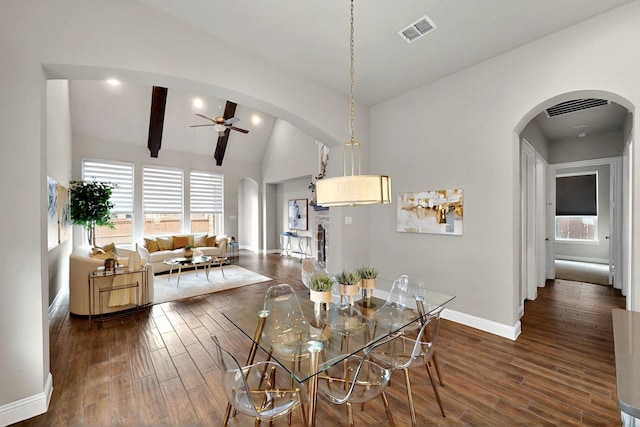 12164 Curry Creek Dr, Frisco, TX 75035 - dining area featuring arched walkways, vaulted ceiling, ceiling fan, dark wood-style floors, and plenty of natural light