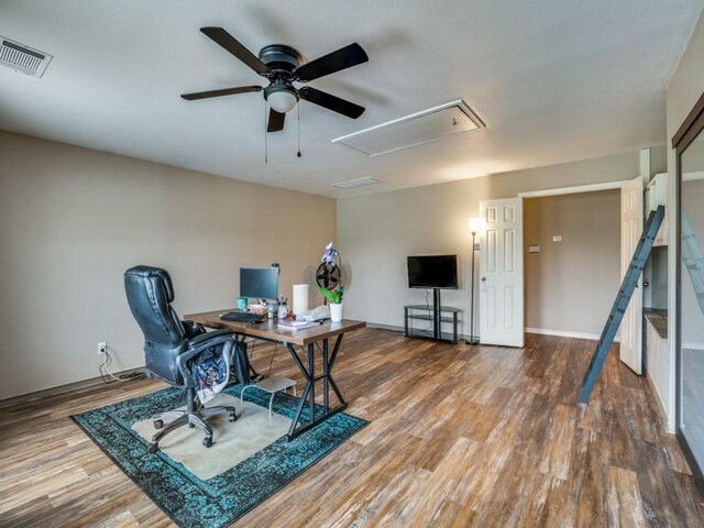 605 Lakeridge Dr, Lavon, TX 75166 - home office featuring attic access, ceiling fan, wood finished floors, and baseboards