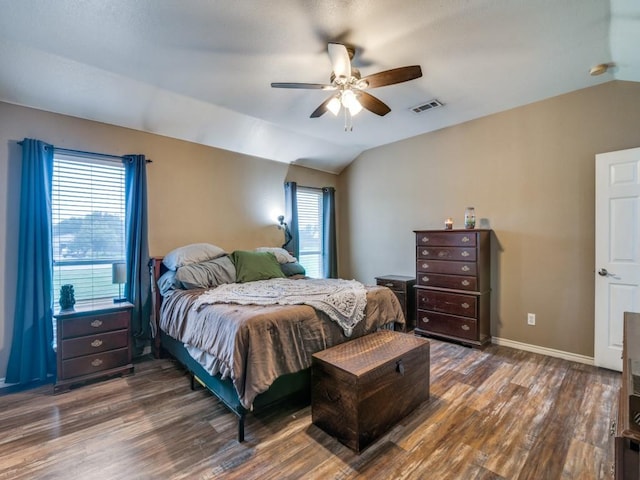 605 Lakeridge Dr, Lavon, TX 75166 - bedroom with dark wood-style flooring, vaulted ceiling, baseboards, and a ceiling fan