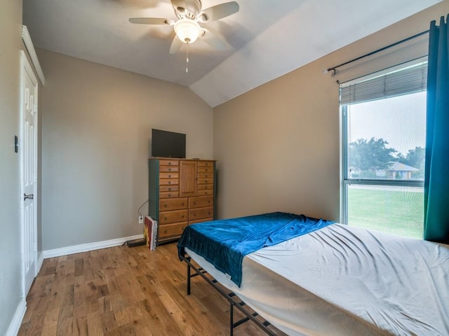 605 Lakeridge Dr, Lavon, TX 75166 - bedroom with wood finished floors, baseboards, lofted ceiling, and ceiling fan