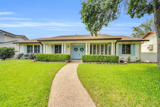 12327 Band Box Pl, Dallas, TX 75244 - ranch-style home with brick siding, a front lawn, and an AC wall unit