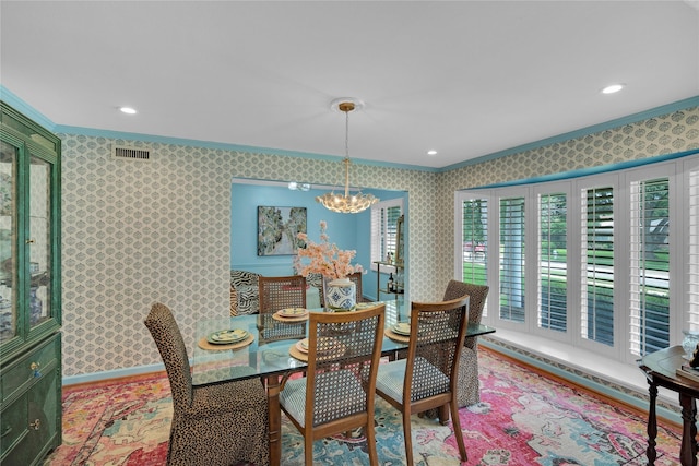 12327 Band Box Pl, Dallas, TX 75244 - dining room with crown molding, wallpapered walls, a chandelier, and recessed lighting