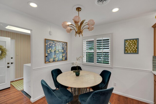 12327 Band Box Pl, Dallas, TX 75244 - dining area featuring baseboards, a chandelier, wood finished floors, recessed lighting, and crown molding