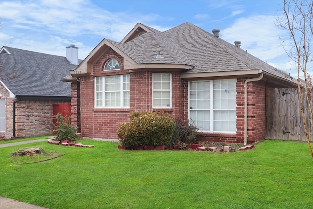 2323 Weatherby Dr, Mesquite, TX 75181 - view of property exterior with brick siding, a shingled roof, and a chimney