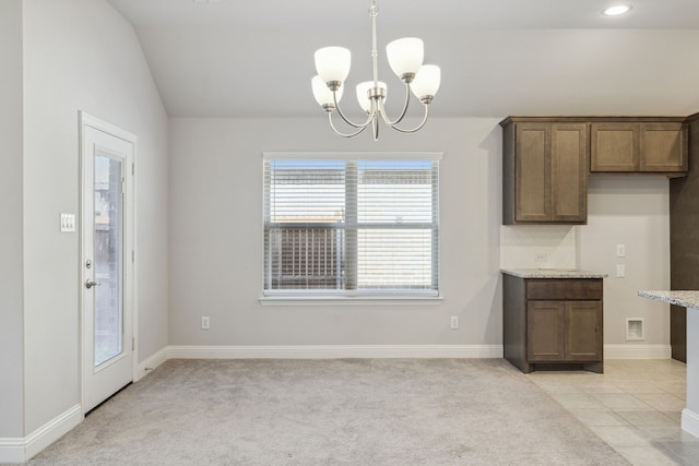 548 Bradley Dr, Fate, TX 75087 - unfurnished dining area featuring a chandelier, light colored carpet, baseboards, vaulted ceiling, and recessed lighting