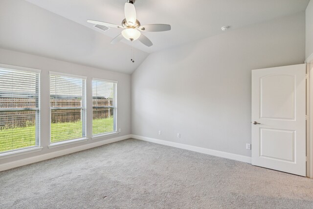 548 Bradley Dr, Fate, TX 75087 - empty room with vaulted ceiling, carpet, ceiling fan, and baseboards