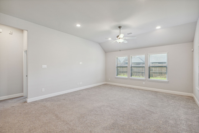 548 Bradley Dr, Fate, TX 75087 - spare room with light colored carpet, ceiling fan, vaulted ceiling, baseboards, and recessed lighting