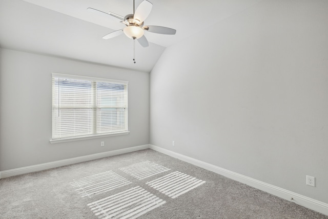 548 Bradley Dr, Fate, TX 75087 - empty room featuring ceiling fan, carpet, vaulted ceiling, and baseboards