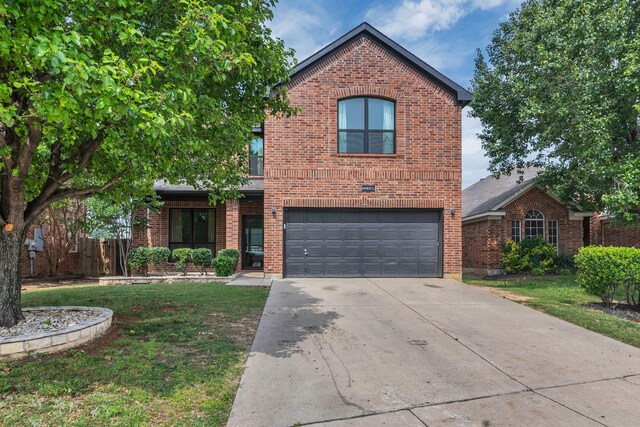 10721 Emerald Park Ln, Fort Worth, TX 76052 - view of front facade featuring an attached garage, brick siding, and driveway