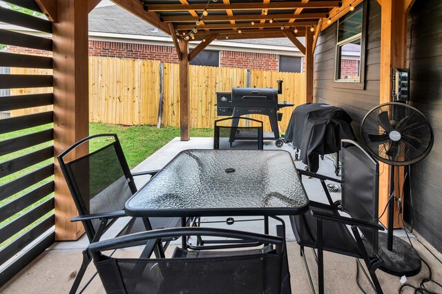 10721 Emerald Park Ln, Fort Worth, TX 76052 - view of patio / terrace featuring outdoor dining space, fence, and a grill