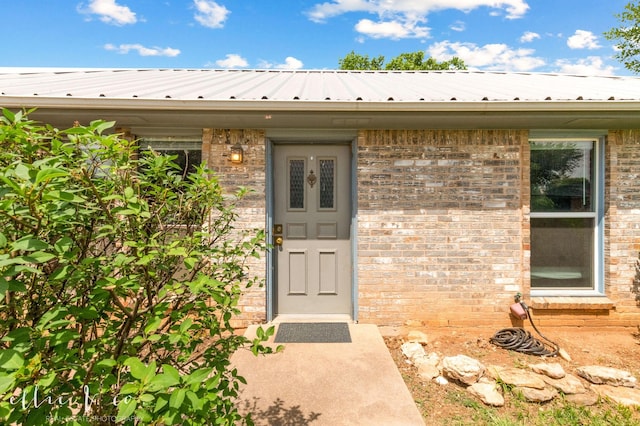 3718 Radcliff Rd, Abilene, TX 79602 - property entrance with brick siding and metal roof