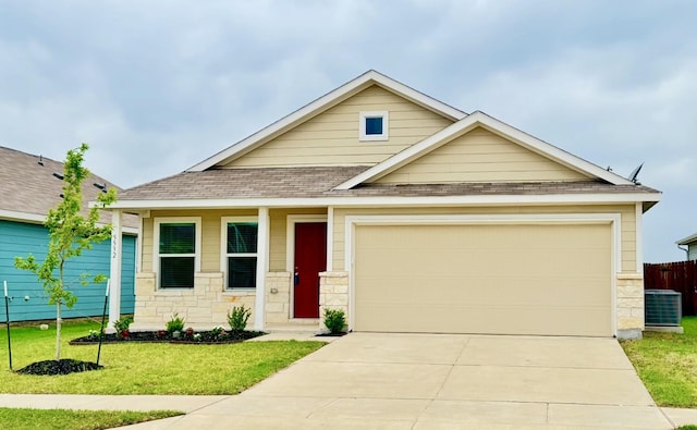 5532 Timber Point Dr, Princeton, TX 75407 - view of front of property with driveway, a front yard, a shingled roof, and central AC unit