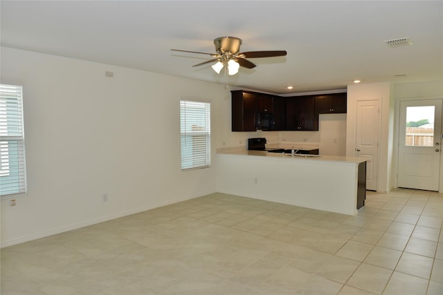 5532 Timber Point Dr, Princeton, TX 75407 - kitchen featuring black appliances, a sink, ceiling fan, light countertops, and plenty of natural light